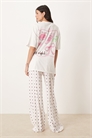 Комплект пижамы ASOS DESIGN: длинная футболка свободного кроя и брюки с широкими штанинами артикул 149249077