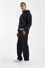 Коллекция моделей с круглым кроем: джоггеры с прямыми брючинами артикул 148701774
