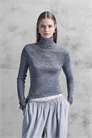 Свитерок с высоким воротником из мериносовой шерсти, связанный из полупрозрачной ткани артикул 151304591