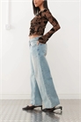 Просторные джинсы с широкими брючинами и заниженной талией артикул 142402697