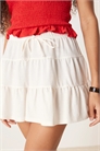 Мини-юбка с оборками и расклешенным низом артикул 143378503